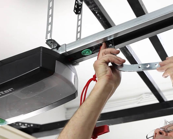 Technician performing garage door opener replacement at Parkland Garage Door Repair Services site