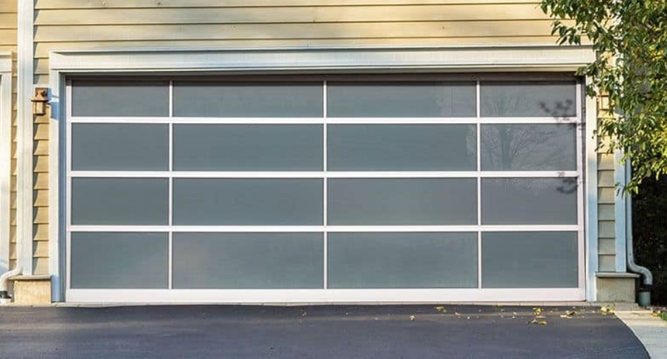 Professional technician performing garage door panel repair in Parkland, FL