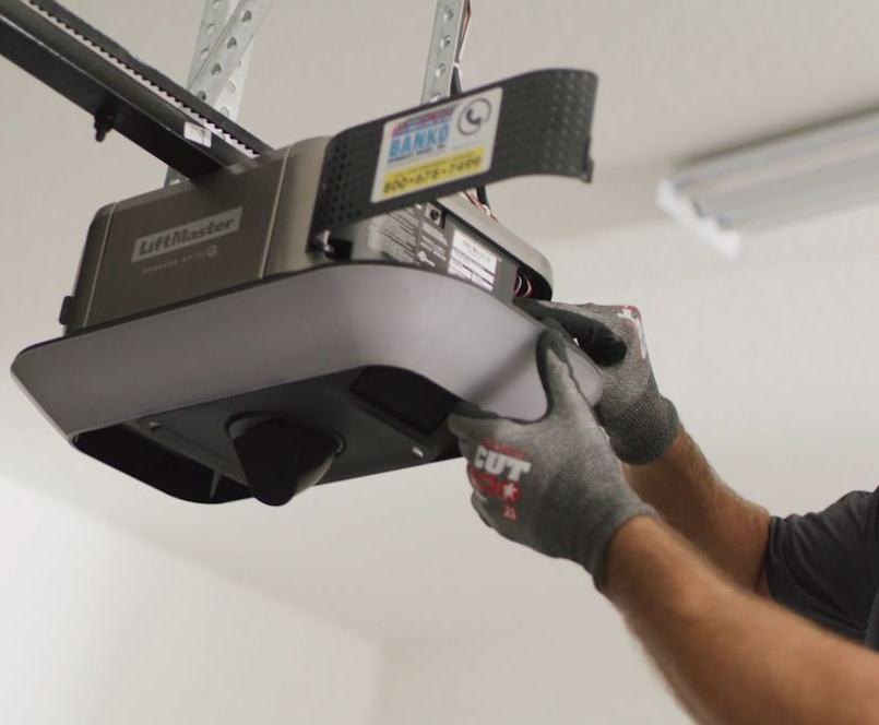 Technician performing professional garage door opener repair in Parkland, FL - Parkland FL Garage Door Repair Services