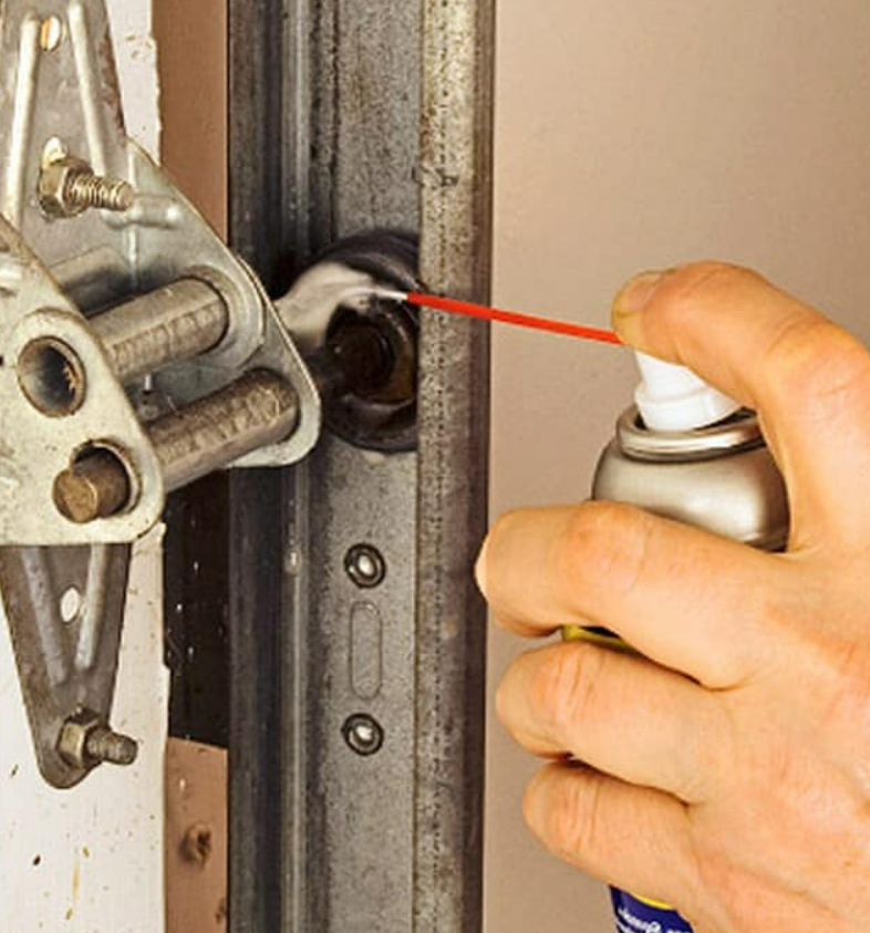 Noisy garage door repair service in Parkland, FL - professional technician fixing garage door issues for a quieter, more efficient operation.